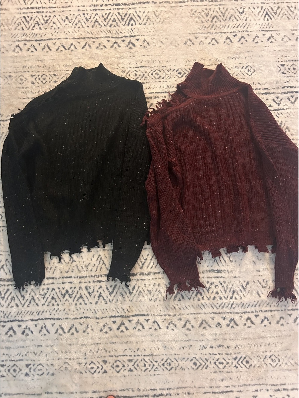 Set of Two Distressed Turtleneck Sweaters in Black and Burgundy